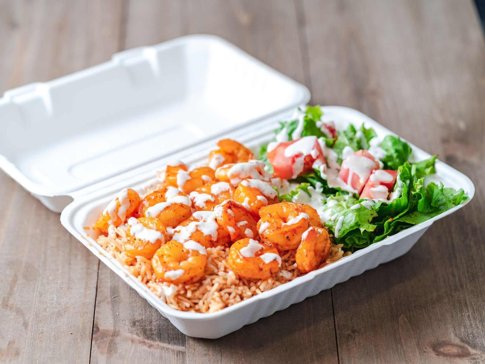 Grill Shrimp Over Rice and Salad.