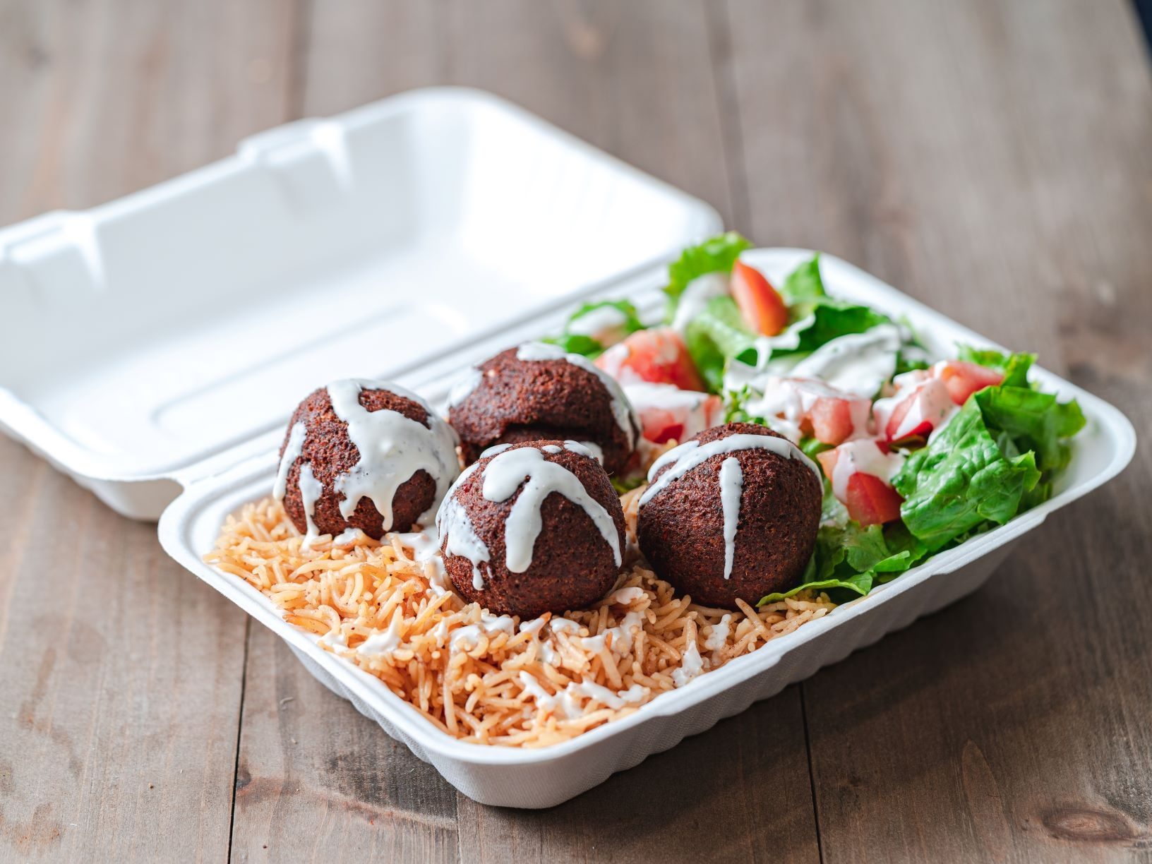 Falafel Over Rice & Salad.